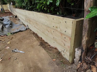 Timber Retaining Walling Claygate, Surrey, KT10 - Repair and replacement of sections of old, dilapidated timber walling. Timber Retaining Walling Claygate, Surrey, KT10 - Repair and replacement of sections of old, dilapidated timber walling.