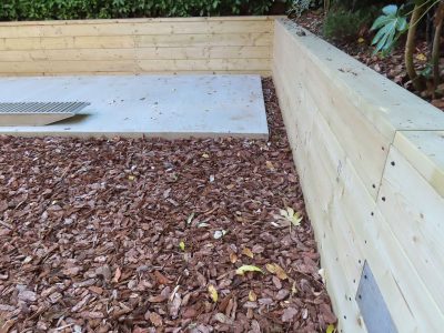 Timber Retaining Walling Claygate, Surrey, KT10 - Repair and replacement of sections of old, dilapidated timber walling. Timber Retaining Walling Claygate, Surrey, KT10 - Repair and replacement of sections of old, dilapidated timber walling.