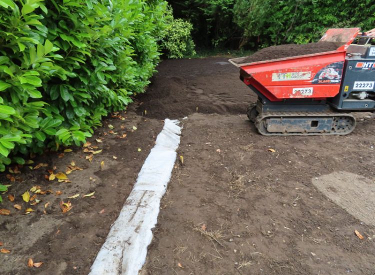 Turfing and Lawn Drainage Esher, Surrey KT10 - Turfing of a rear garden after a drainage installation.