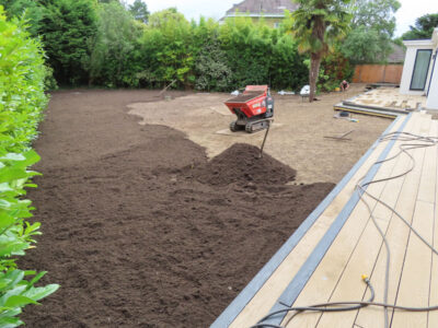 Turfing and Lawn Drainage Esher, Surrey KT10 - Turfing of a rear garden after a drainage installation. Turfing and Lawn Drainage Esher, Surrey KT10 - Turfing of a rear garden after a drainage installation.