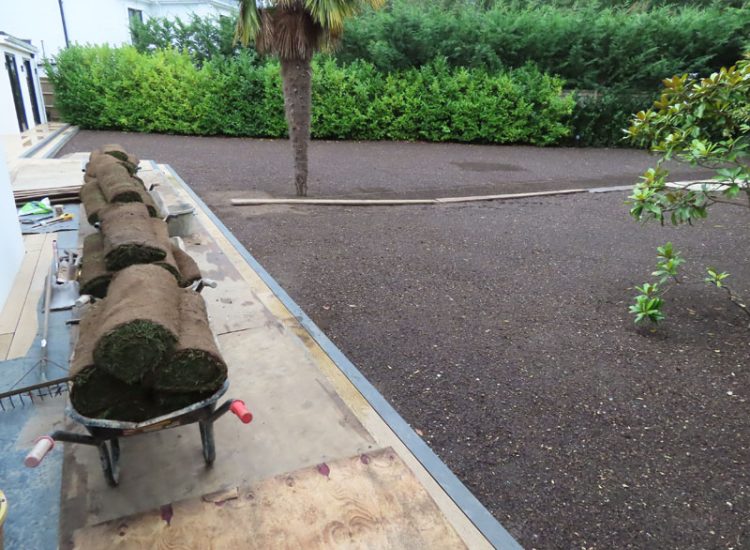 Turfing and Lawn Drainage Esher, Surrey KT10 - Turfing of a rear garden after a drainage installation. Turfing and Lawn Drainage Esher, Surrey KT10 - Turfing of a rear garden after a drainage installation.