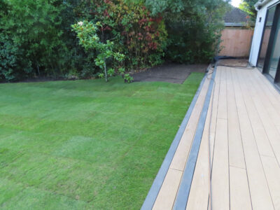 Turfing and Lawn Drainage Esher, Surrey KT10 - Turfing of a rear garden after a drainage installation. Turfing and Lawn Drainage Esher, Surrey KT10 - Turfing of a rear garden after a drainage installation.